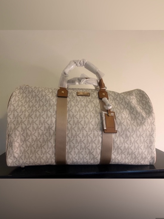Michael Kors Handbags - NWT! Michael Kors Jet Set Travel Cream and Tan MK Logo Double Pocket Duffel/Tote